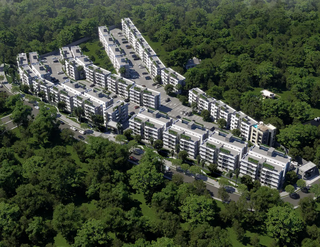 Vista aérea del conjunto Embassy Gardens rodeado de bosque en Arroyo Hondo